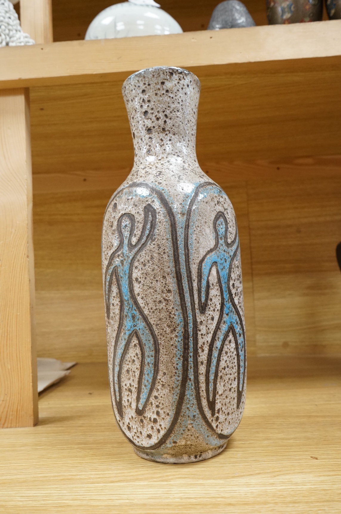 A mid century French Accolay pottery vase decorated with dancing figures, 37.5cm